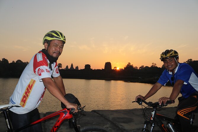 Angkor Sunrise Expedition Cycling Through Serene Backroads - Bayon: the face towers and the temple pass reality