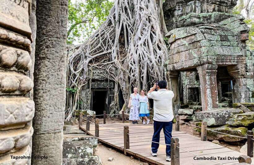 From Phnom Penh: Angkor Wat, Bayon, and Ta Prohm Day Trip - Ta Prohm: the Tomb Raider temple where the jungle does the restoring