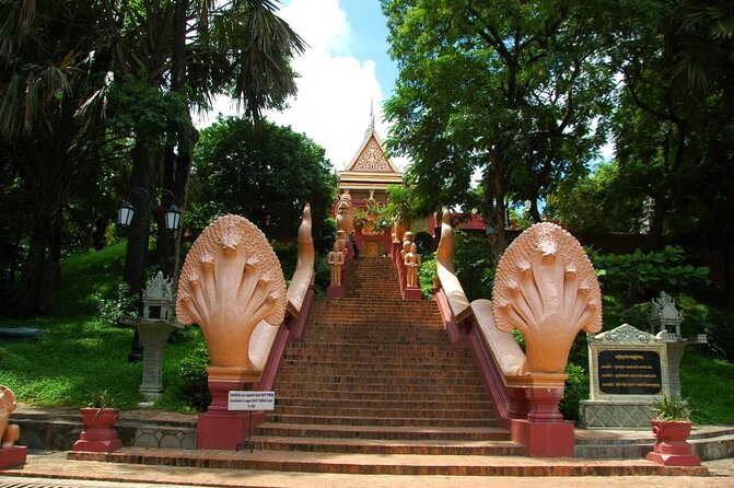 Half-Day Royal Palace, Wat Phnom & Independence Monument Tour - Wat Phnom on a hill: the last stop that still feels like Phnom Penh