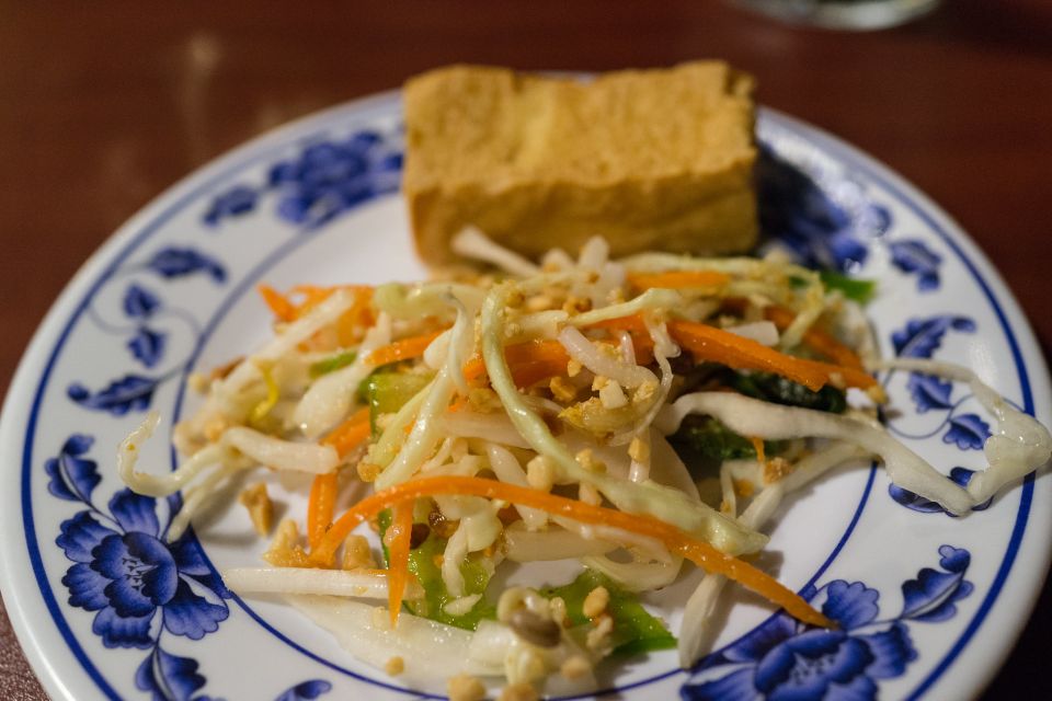 Phnom Penh: Evening Food Tour with Drinks & Tuk Tuk Included - Russian Market after dark: ingredients, BBQ bites, and dessert time