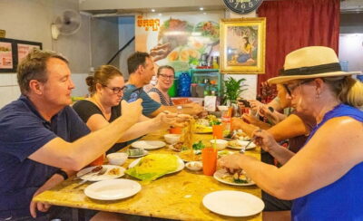 Phnom Penh: Night Foodie Tour by Tuk Tuk with Drinks - Riverfront noodles: the perfect warm-up stop