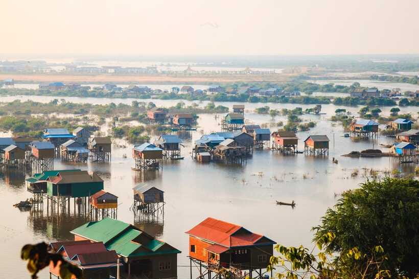 Siem Reap: Half-Day Kampong Phluk with Sunset, Boat & Guide - Hidden Gem and Secret Sunset Stop: When the Day Turns into Photos