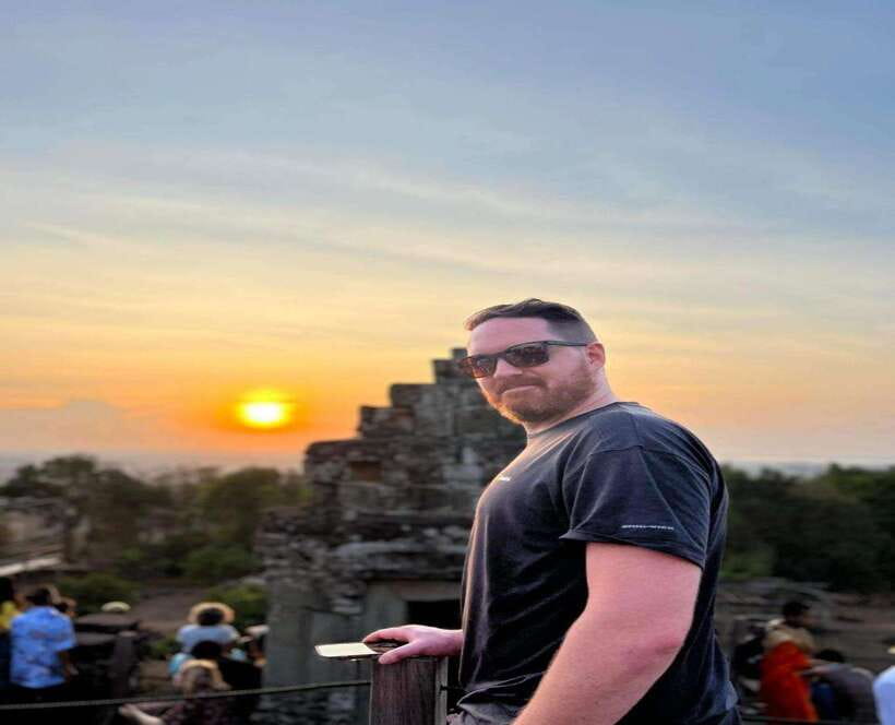 Small-Group Full Day Angkor wat Guide tour with Sun set - Angkor Thom’s southern gate and Bayon’s faces